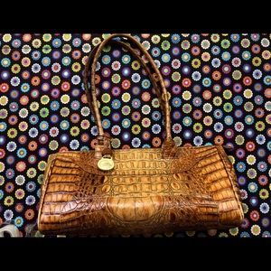 Slight wear on piping near bottom. Some marks inside. Non-smoking home.